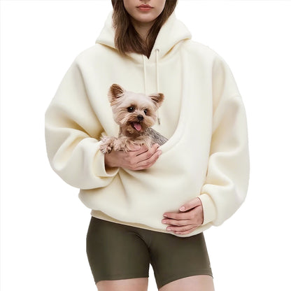 The Heartpouch Hoodie in Milky White with a small dog in the front pouch
